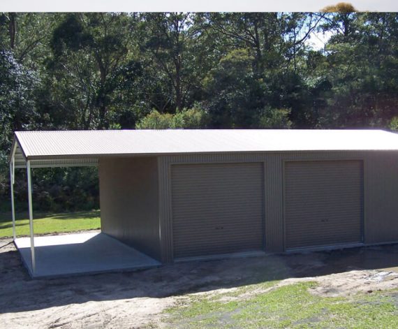 An image showing a shed with two sliding doors and a covered area